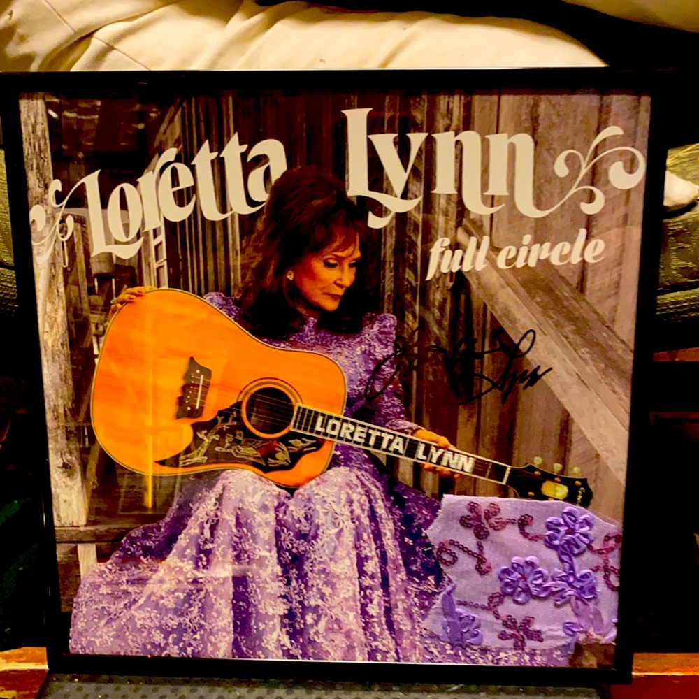 Loretta Lynn autograph vinyl album with piece of gown cloth from gown on cover